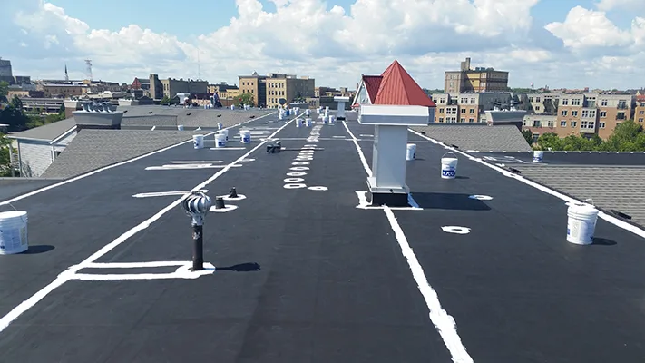 Maintaining and Extending the life of your existing flat roof